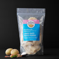 Frozen loaded baked potato pierogie pouch with handmade label and several pierogies inside