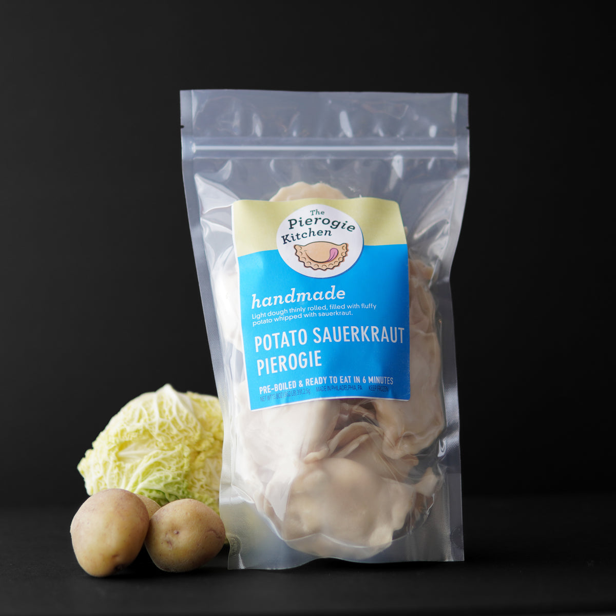 Frozen potato sauerkraut pierogi in sealed stand-up foil bag